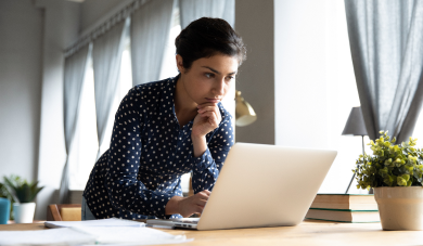 Person on computer thinking